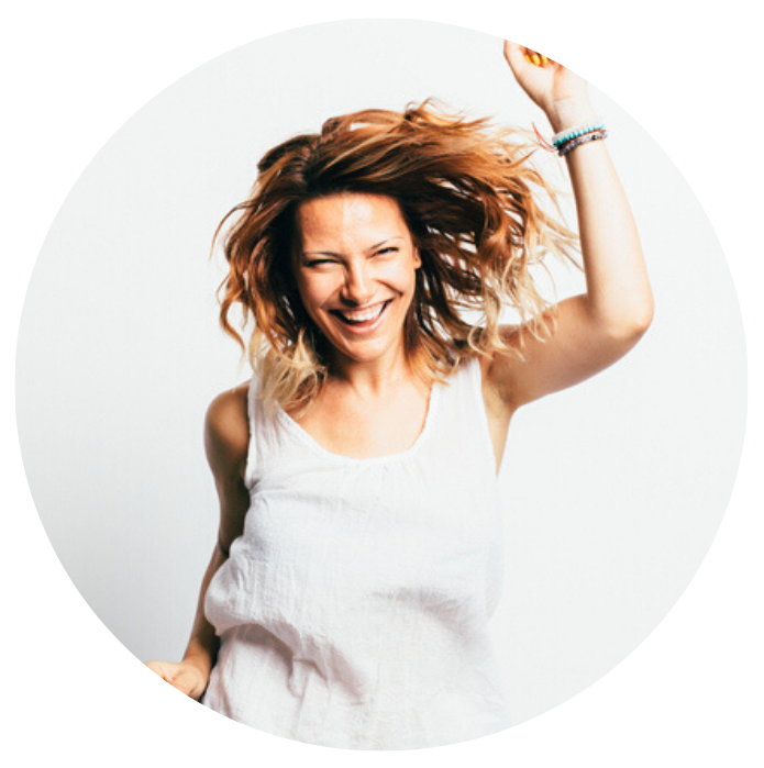 Woman jumping with energy after thyroid treatment